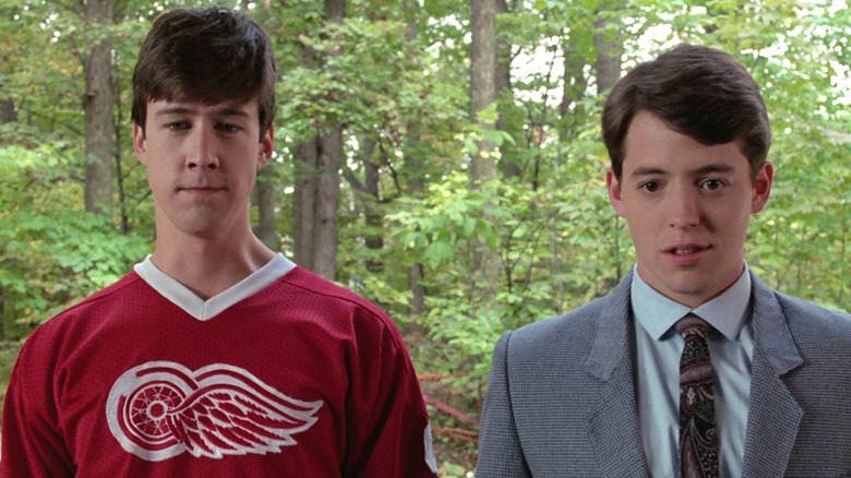 Cameron and Ferris look at the car offscreen in Ferris Bueller's Day Off