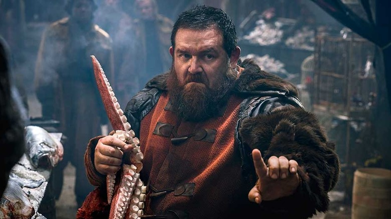 Nick Frost as Bajie holding a squid ready to fight in Into the Badlands