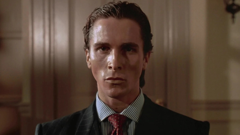 Patrick Bateman staring out of his soulless eyes in American Psycho