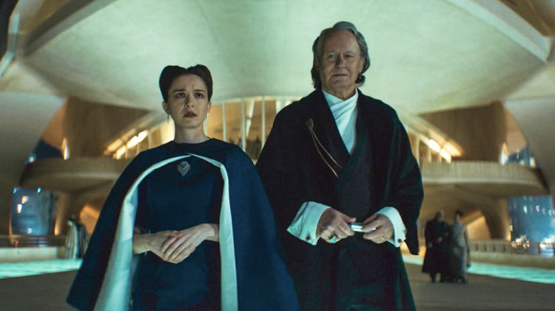 Kleya Marki (Elizabeth Dulau) and Luthen Rael (Stellan Skarsgard) attend a party in Andor