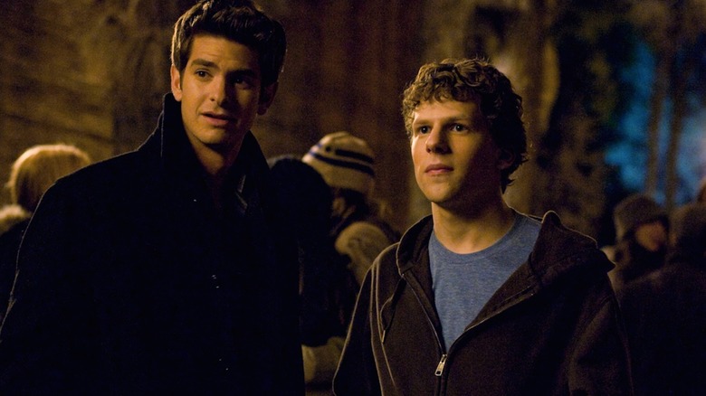 Andrew Garfield as Eduardo Saverin and Jesse Eisenberg as Mark Zuckerberg sport stylish fall wear in The Social Network