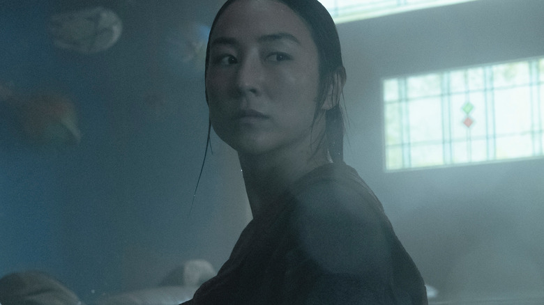 Greta Lee as Ann in The Last House