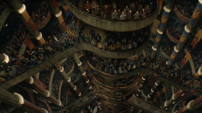 People gathering at the staircase in Silo