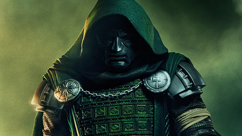 Robert Downey Jr's Dr Doom is seen standing amid green smoke in a poster for Avengers Doomsday.jpg
