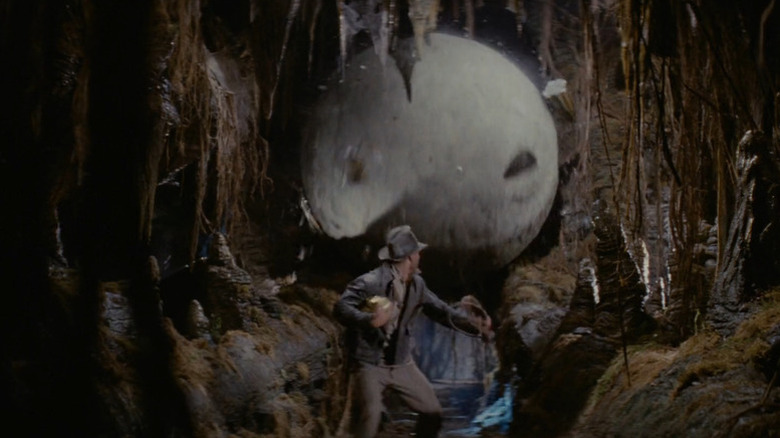 Indiana Jones running from a boulder in Raiders of the Lost Ark