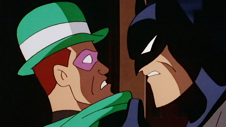 Batman: The Animated Series - An angry Batman holding a frightened Riddler up by the collar