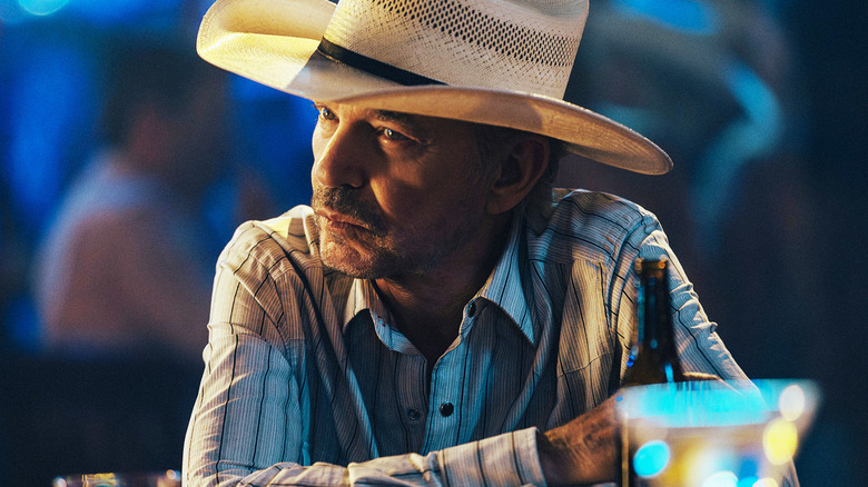 Billy Bob Thornton's Tommy Norris sits in a bar in Landman