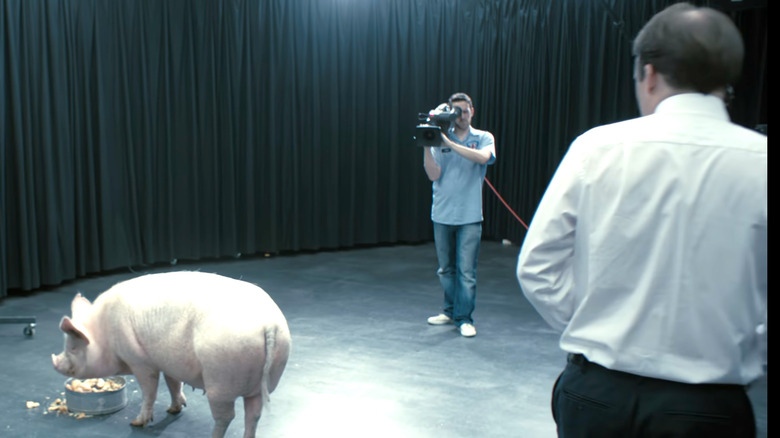 Prime Minister Michael Callow (Rory Kinnear) stands next to pig on Black Mirror