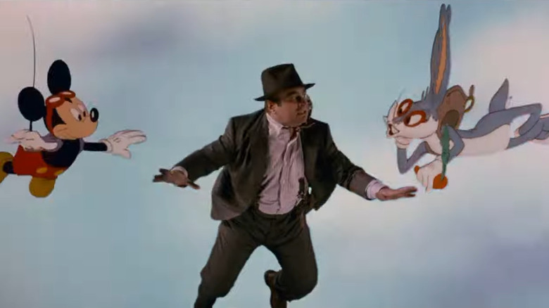 Eddie Valiant falling inbetween Mickey Mouse and Bugs Bunny in Who Framed Roger Rabbit