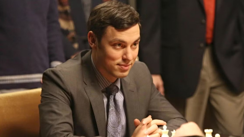 Lance candy sitting at a table on legs