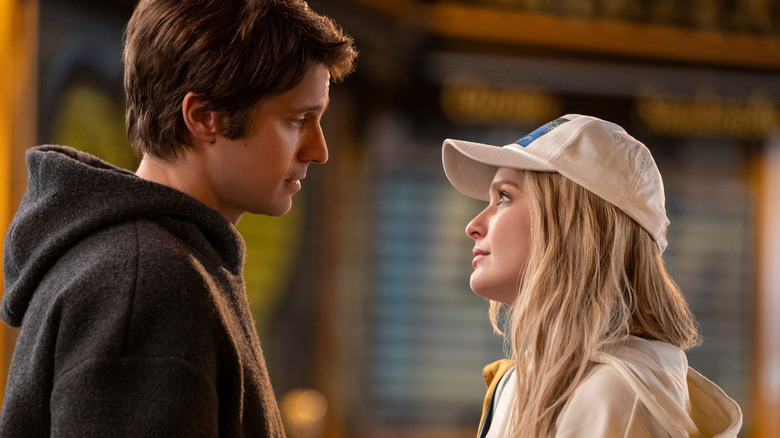 Camille and Gabriel talk outside Emily in Paris