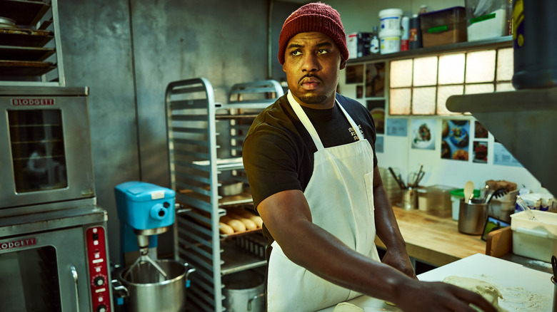 Lionel Boyce as Marcus working with dough in The Bear