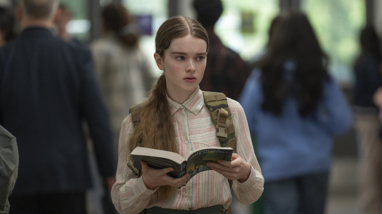 Carrie in the halls with a book in Carrie (2026)
