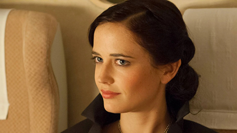 Eva Green as Vesper Lynd sitting across from James Bond on the train in Casino Royale
