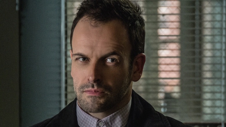 Johnny Lee Miller in the role of Sherlock Holmes Yuk on the eyebrow on elementary