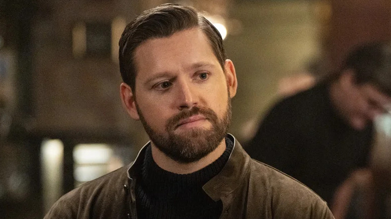 Luke Kleintank's Scott Forrester looking thoughtful on FBI: International