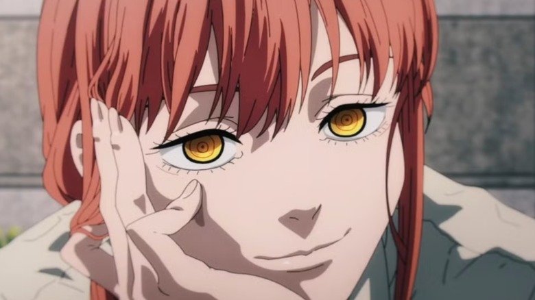 Chainsaw Man -  Makima smiling as she rests her face on her hand