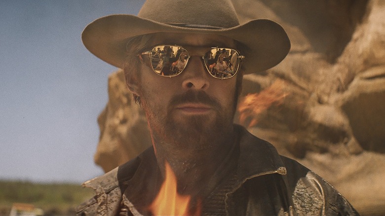 Ryan Gosling as Colt Sievers in a suit with a cowboy hat while filming the movie 