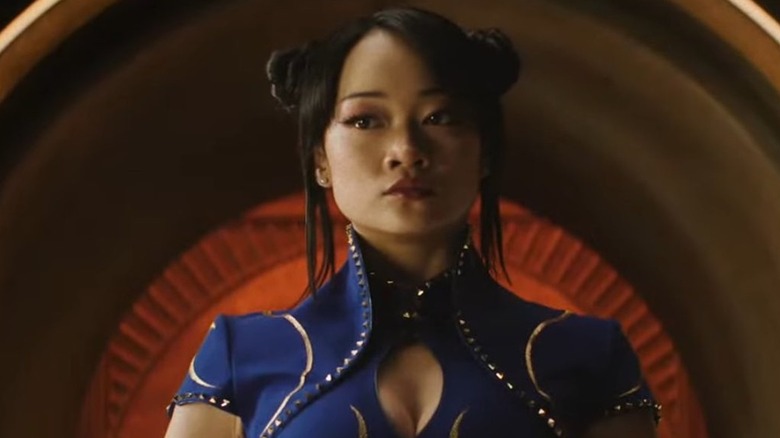 Callina Liang as Chun Li with her hands behind her back in Street Fighter (2026)
