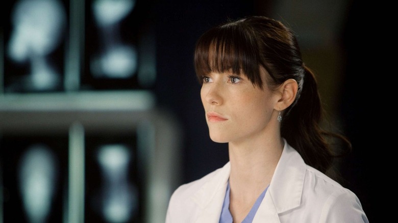 Lexie looking at scans with bangs and her hair pulled back on Grey's Anatomy