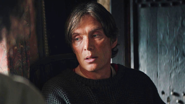 Cillian Murphy as Jim sitting with his daughter at the end of 28 Years Later: The Bone Temple