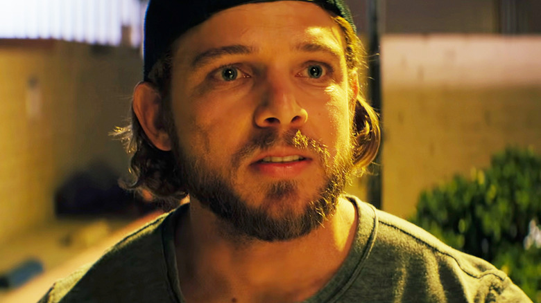 Max Thieriot's Clay Spenser is seen in closeup in SEAL Team