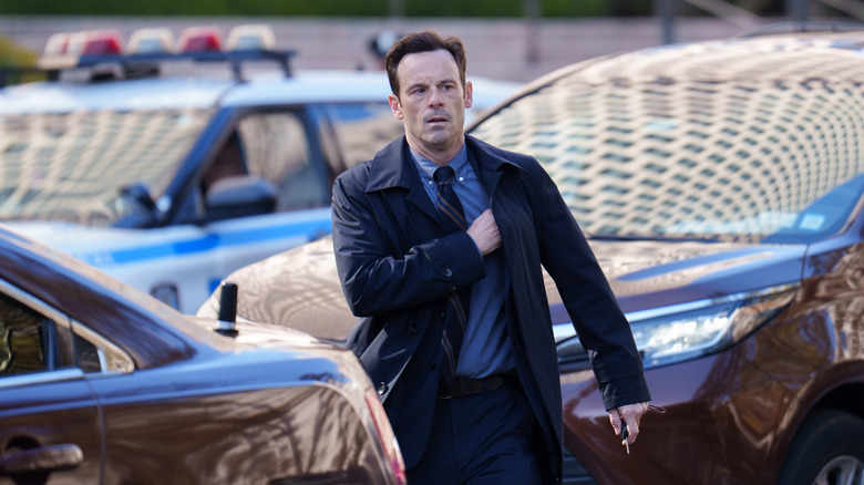 Danny walking through a parking lot on Furious