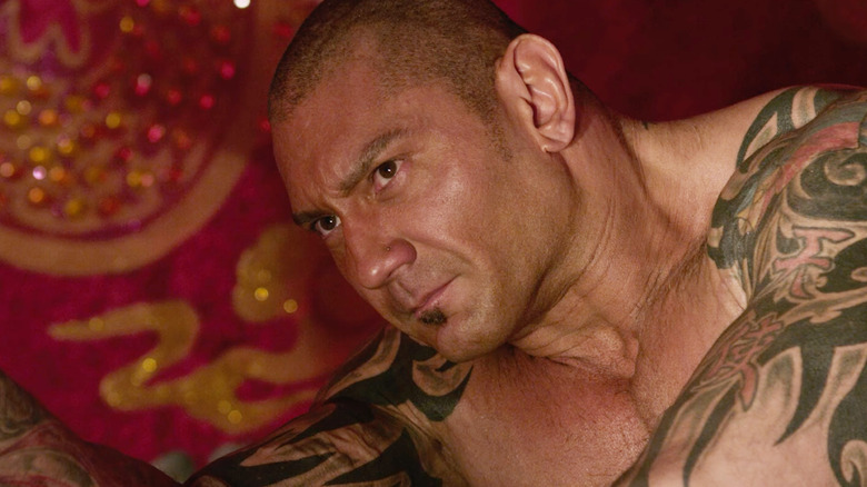 Dave Bautista as Brass Brody glaring in The Man with the Iron Fists