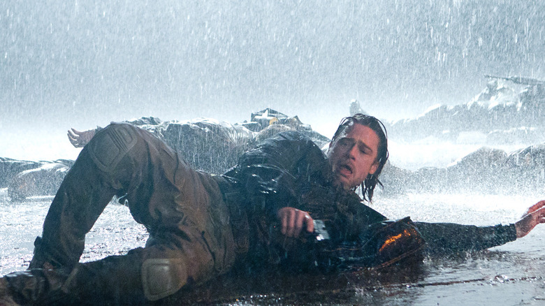 Brad Pitt caught in the rain