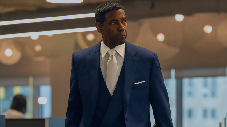 Denzel Washington wearing a blue suit as David King in Highest 2 Lowest