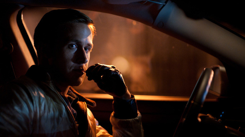 The driver picks his teeth in a quiet moment in Drive