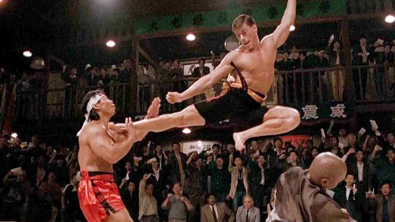 Frank gives his opponent a flying kick in Bloodsport