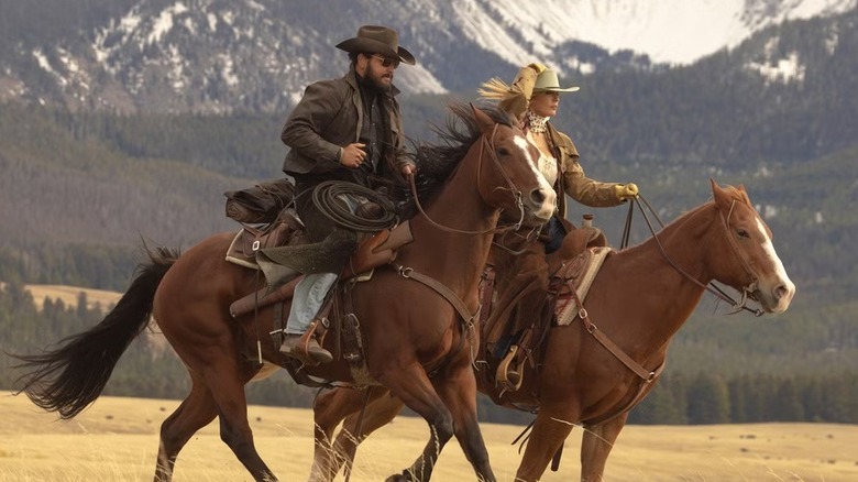 Rip (Cole Hauser) and Beth (Kelly Reilly) riding horses on 
