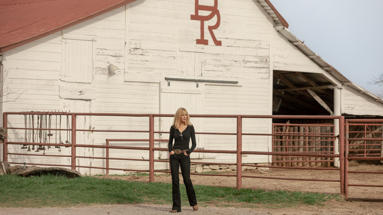 Kelly Reilly's Beth Dutton stands outside her ranch home in Dutton Ranch