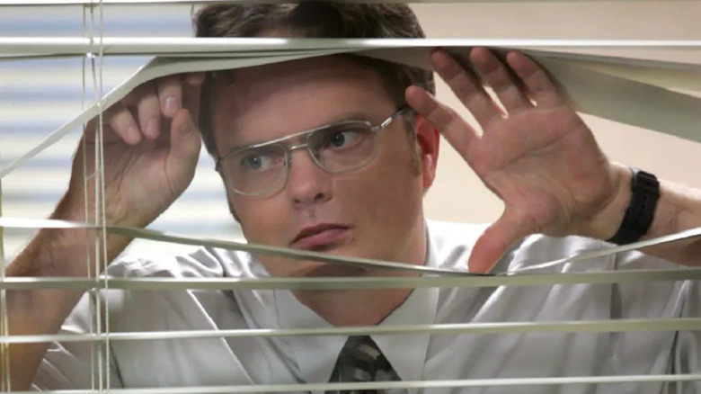 The Office: Dwight looks through blinds