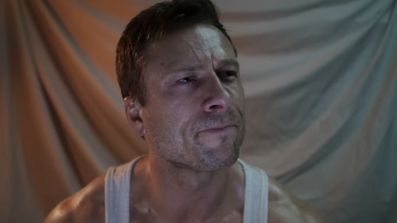 Glen Powell's Ben Richards is seen in closeup in The Running Man