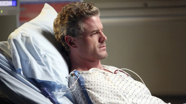 Mark in a hospital bed on Grey's Anatomy