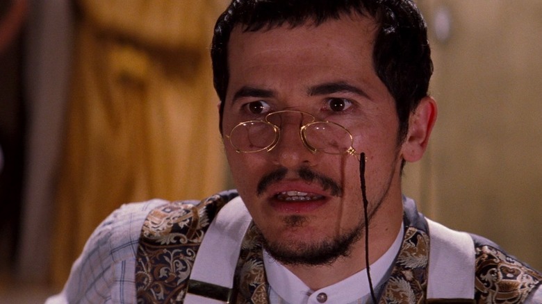 Toulouse wearing tiny glasses and looking shocked in Moulin Rouge!