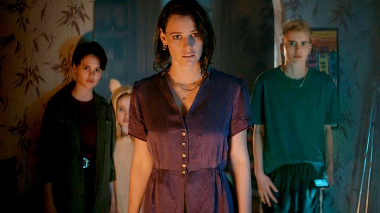 Nell Fisher, Gabrielle Eschols, and Lily Sullivan in Evil Dead Rise