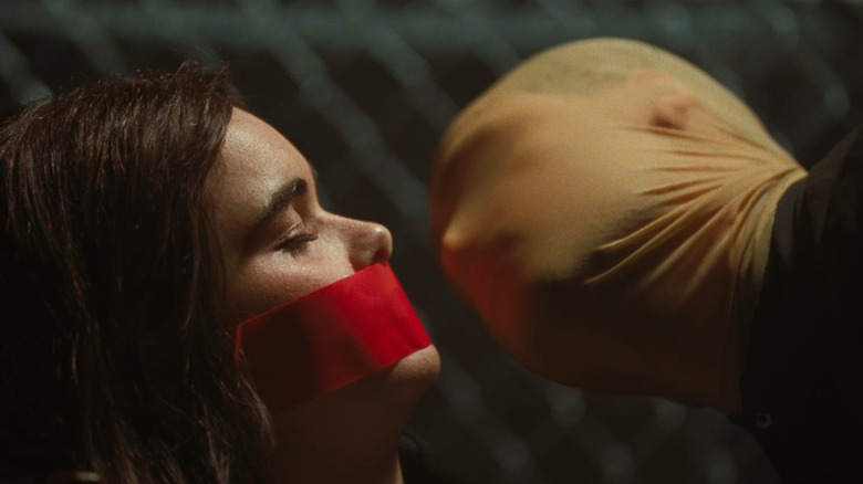 Marot menaced by Arthur in Faces of Death