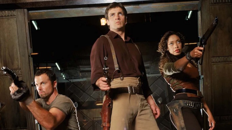 Nathan Fillion, Gina Torres and Adam Baldwin in Firefly