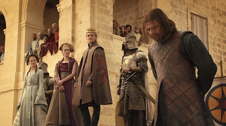 Game of Thrones, Ned about to be executed by Joffrey, while Cersei and Sansa stand to the side