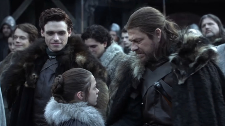 Game of Thrones, Robb and Ned looking at Arya
