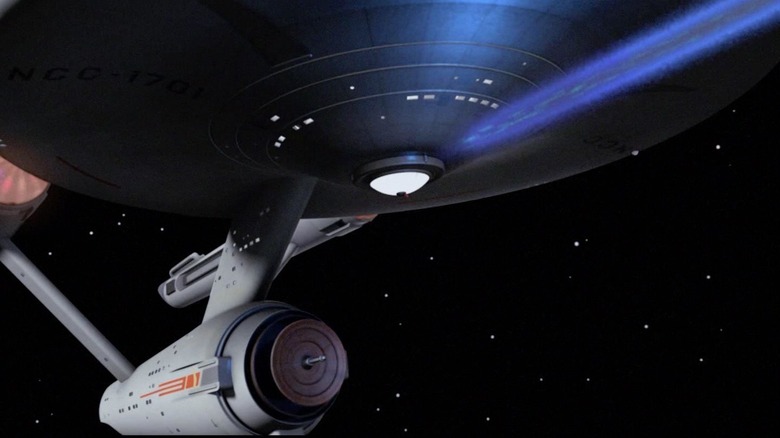 The U.S.S. Enterprise firing its phasers in an episode of Star Trek.
