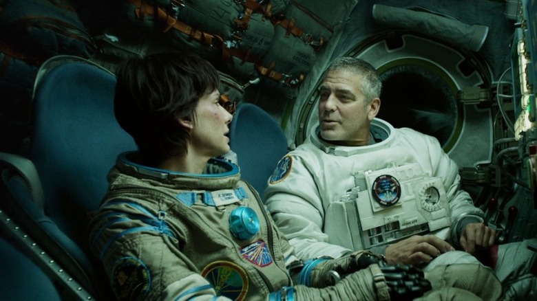 Matt and Ryan talking in the spacecraft in Gravity