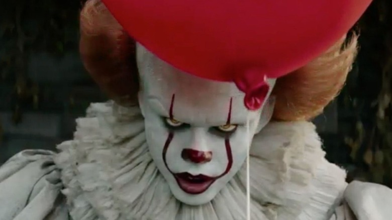 IT (2017) -- Pennywise holding red balloon