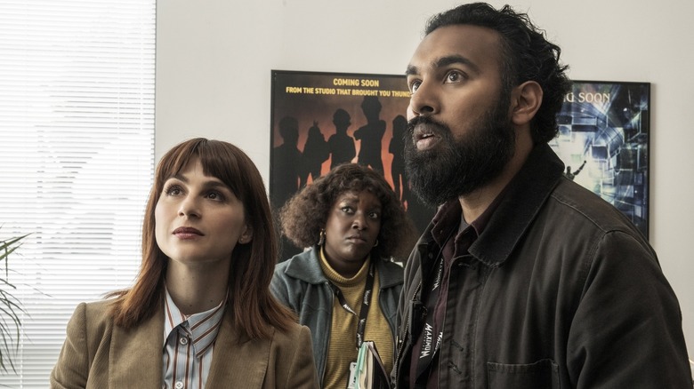 Anita Dag and Daniel looking at something in the distance on The Studio