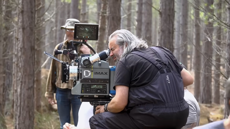 Hoyte van Hoytema lining up a shot with an IMAX camera on the set of The Odyssey (2026)