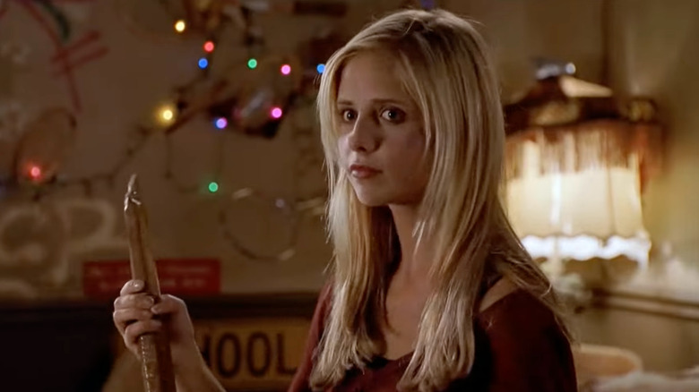 Buffy Summers (Sarah Michelle Gellar) holding a stake in Buffy the Vampire Slayer