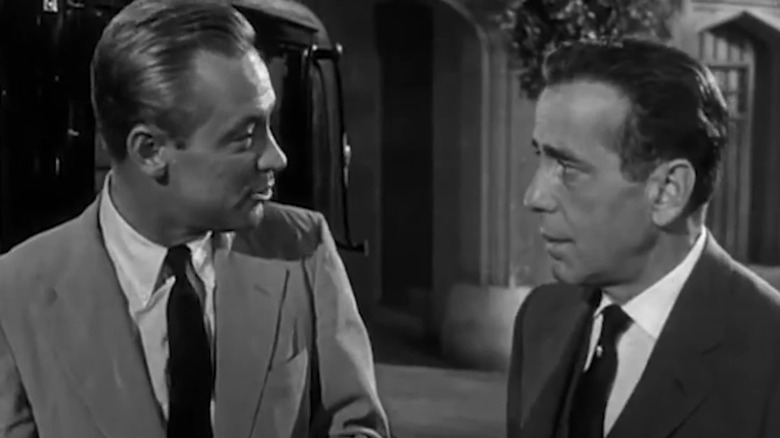 Holden and Bogart conversing